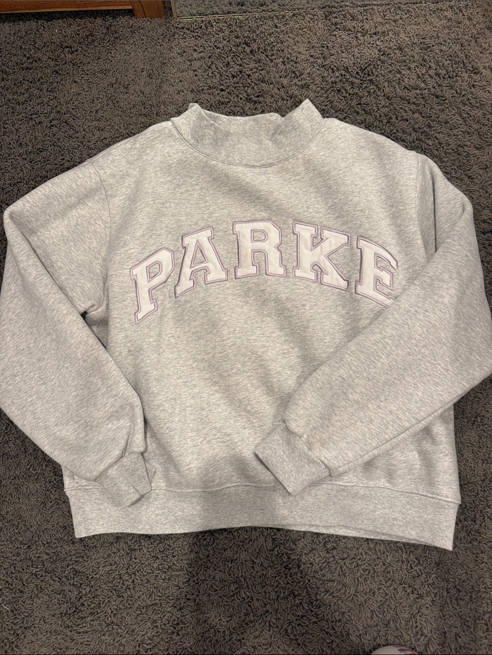 Parker Grey on white Mock-Neck w/ purple embroidery